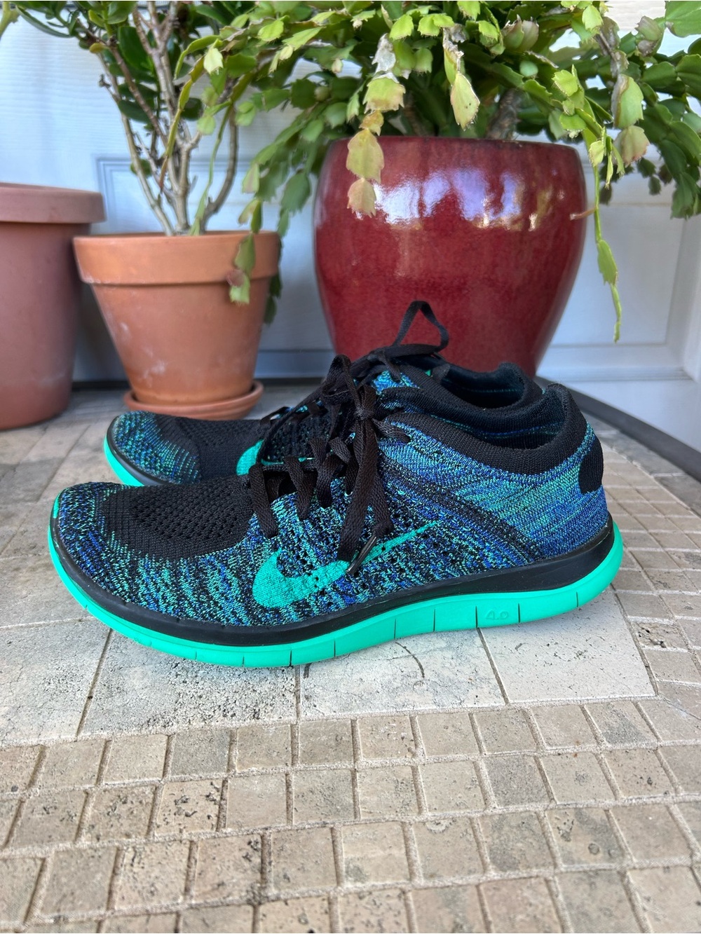 Nike Free 4  FlyKnit women’s Sneakers in Black & Teal Sz 7.5
